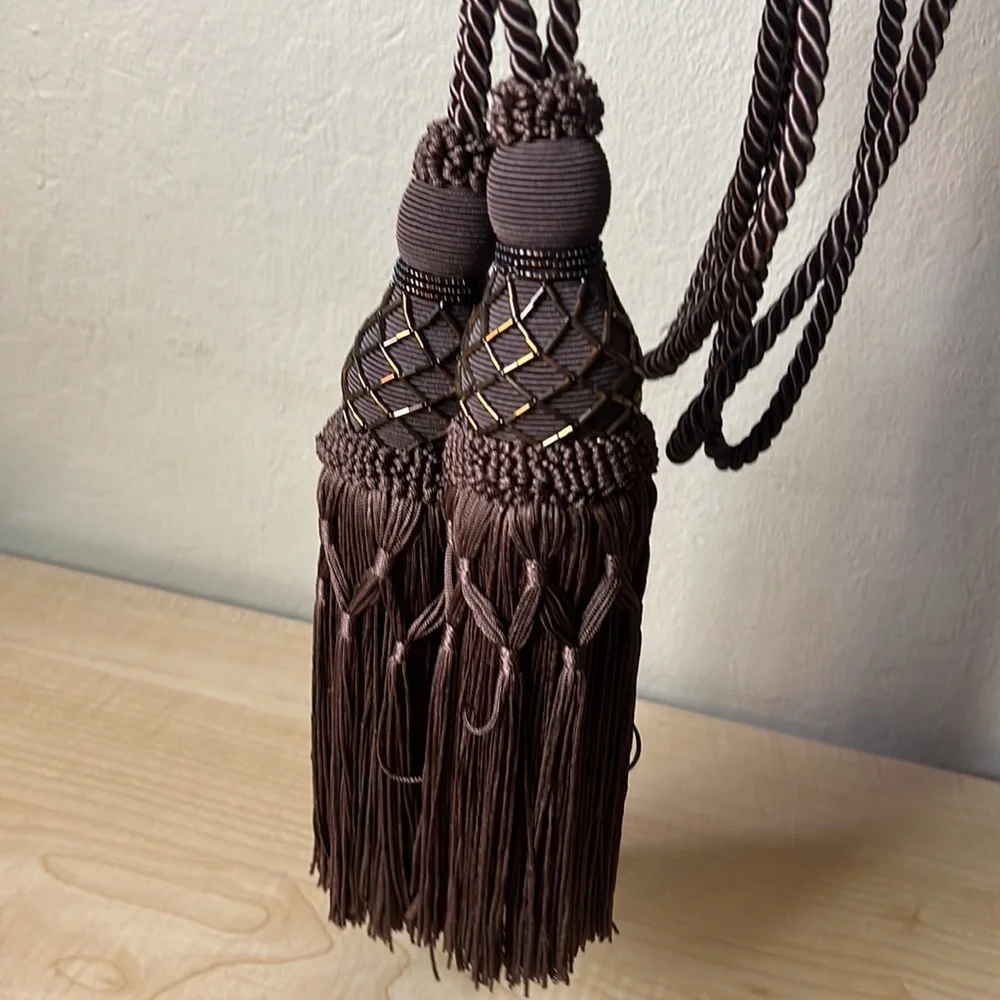 Set of 2 brown curtain tie tassels with copper beads detail approx 24” like new